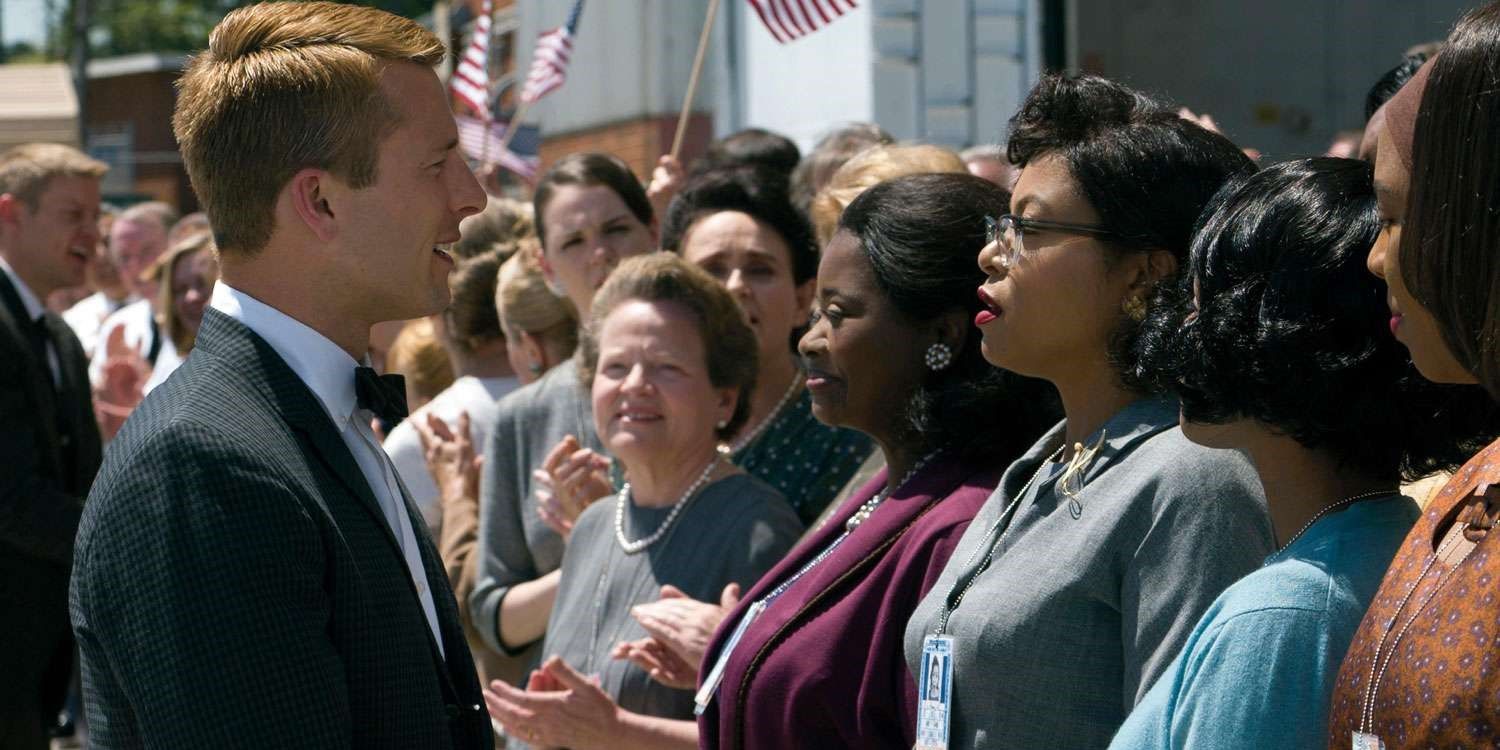Glen Powell in Hidden Figures talking to the crowd