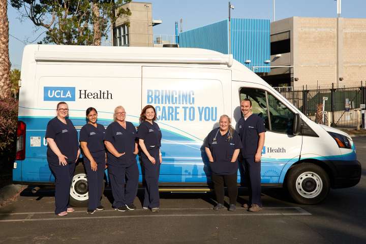 Members of Homeless Healthcare Collaborative Members of Homeless Healthcare Collaborative stand in front of their van